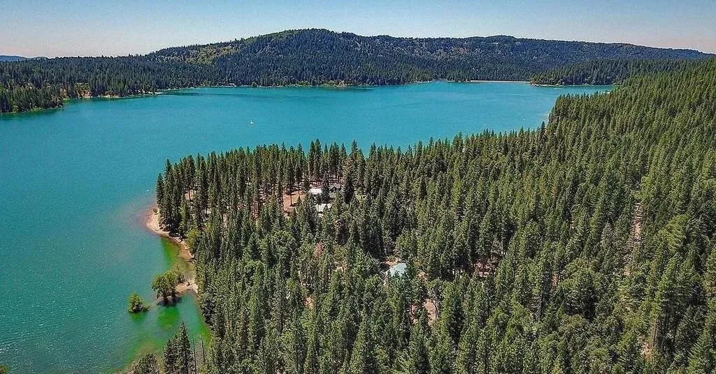 An aerial view of Scott's Flat Lake and its forested shoreline